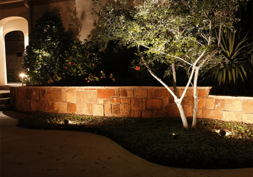 landscaping lights, stone fence